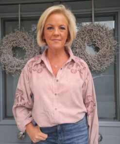 pink embroidered shirt